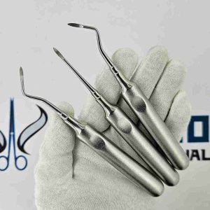 Set of three Heidbrink dental root elevators held in gloved hand for tooth root tip extraction