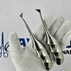 Pair of left and right Cryer elevators surgical dental root extraction tools held in hand.