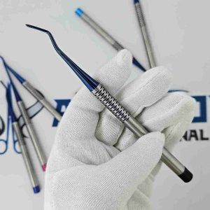 Single blue titanium curved tip PDL dental luxating elevator held in a gloved hand for precise extraction.
