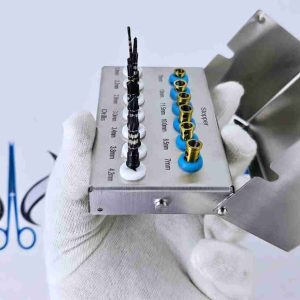 Top-down view of dental implant depth stoppers and drill kit.