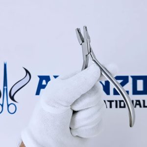 Close-up of tear drop clear aligner plier jaw design in gloved hand.